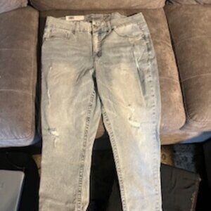 Fashionable faded ripped high-rise jeans